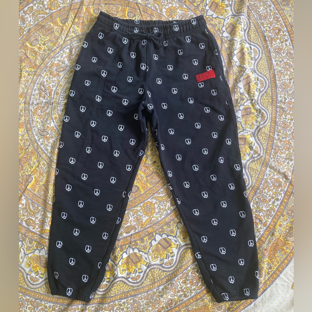 CHNGE organic cotton peace sign sweatpants